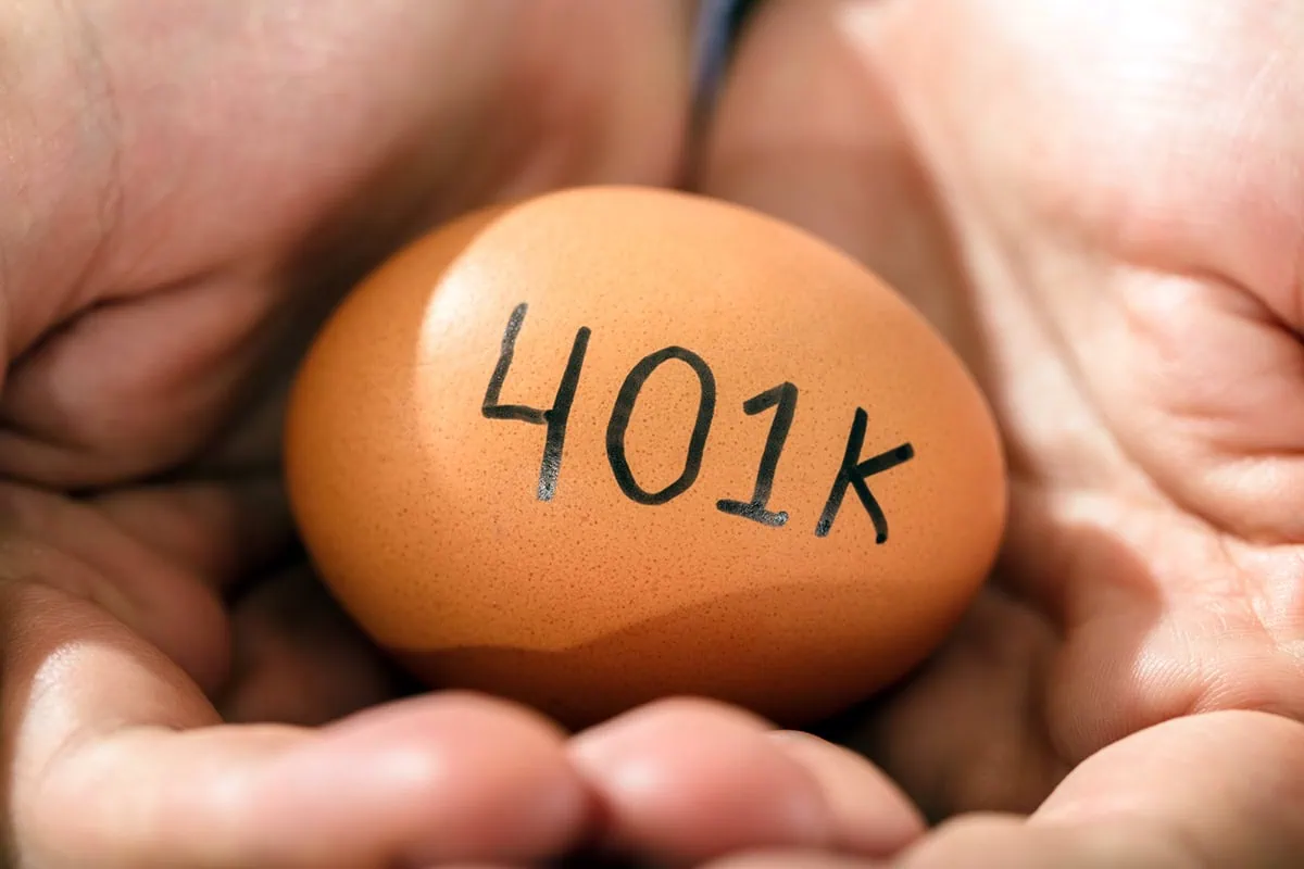 💰 Beyond the Basics: 10 Powerhouse 401(k) Alternatives 2 a person holding a brown egg that says 401k.