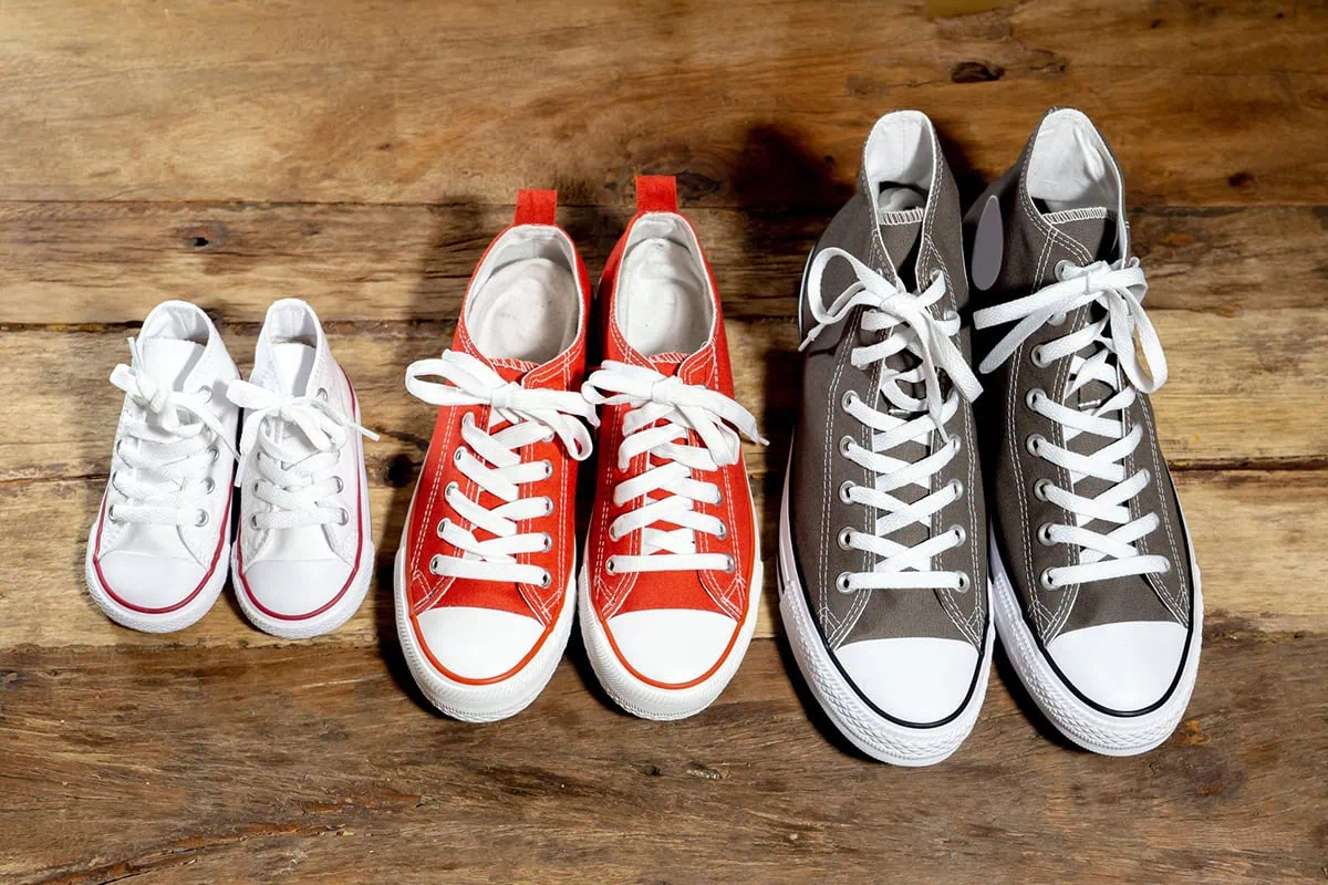small medium and large pairs of shoes.