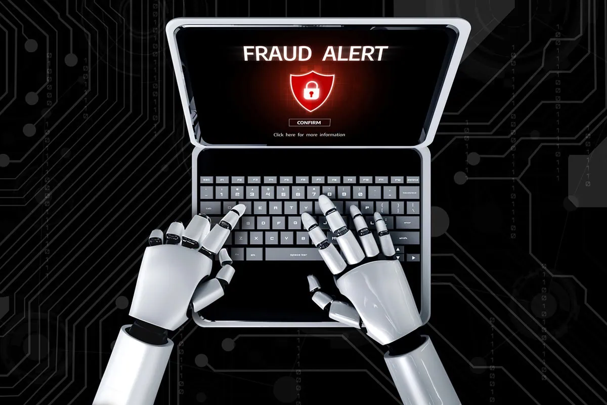 concept art of a robot using a laptop that says fraud alert on the screen.
