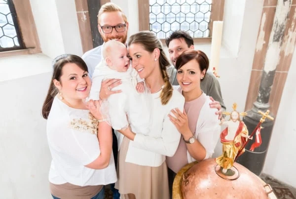 baptism picture with family and baby