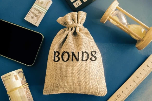 a money bag with the word bonds printed on it.