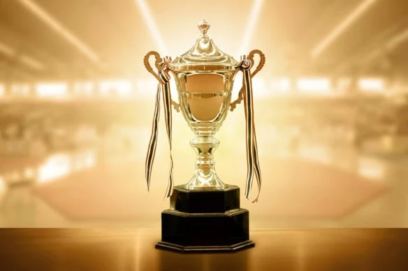 a gold trophy with a shiny gold background.