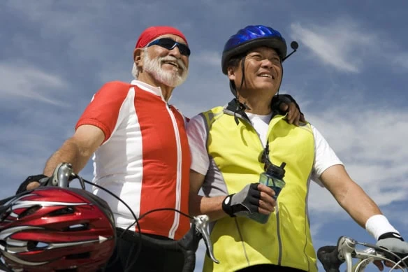 two senior men out biking.