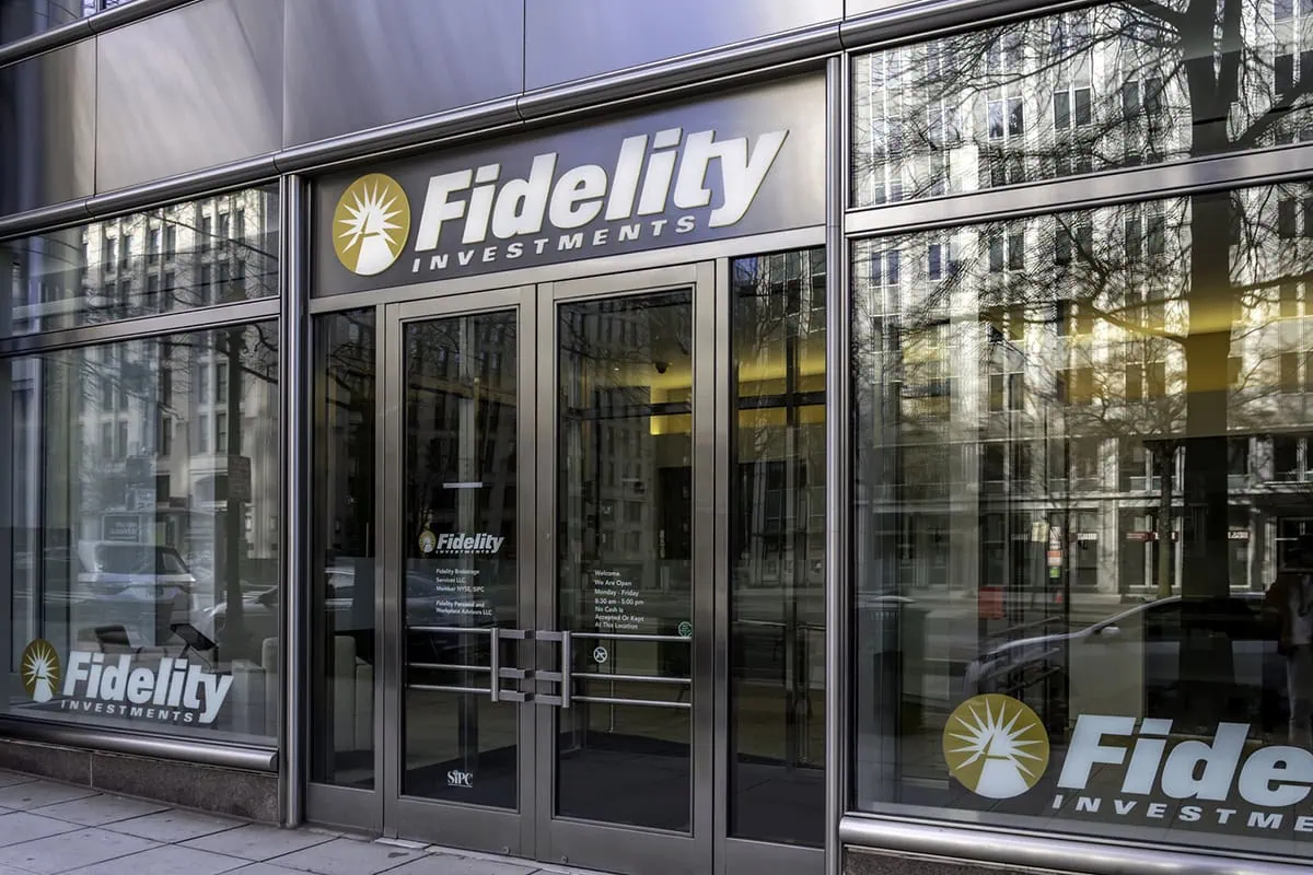 The 11 Best Fidelity Funds to Buy in 2026 2 a fidelity storefront with multiple signs.