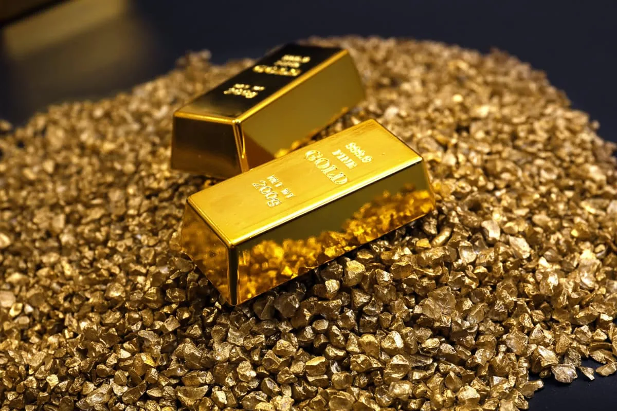 ๐ Sick of Stocks? Try These Top Non-Stock Investments 28 gold bars sit on top of gold nuggets.