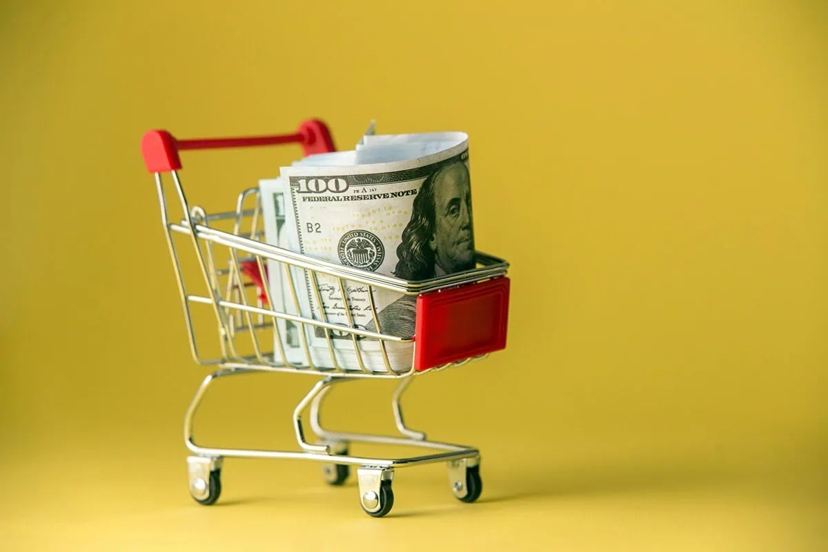 These 3 Consumer Staples Funds Deliver Safety and Income 3 best grocery cart dollar bills 1200