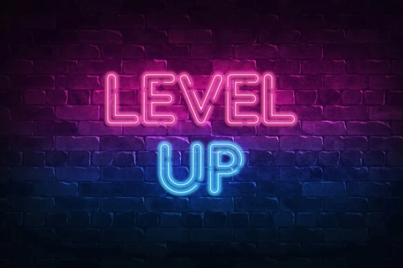 a neon sign that says level up.