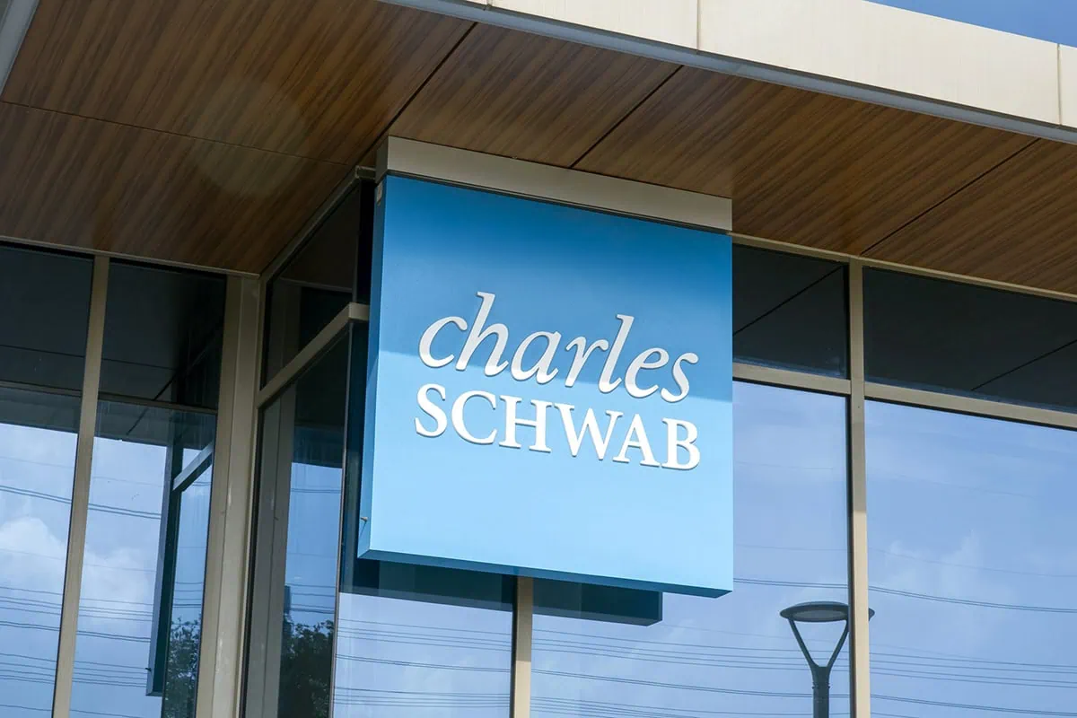 a blue charles schwab sign.