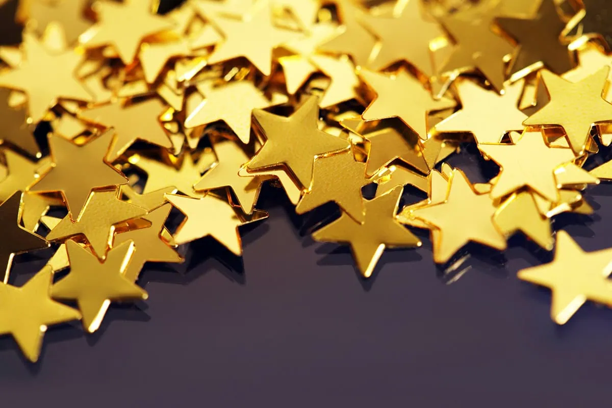 a pile of gold star glitter.