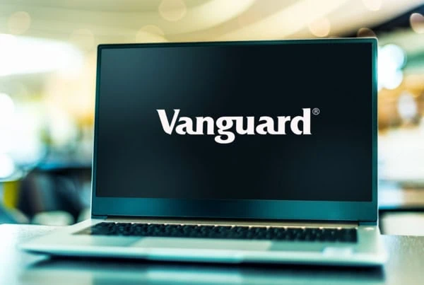 a laptop with the vanguard logo against a black screen.