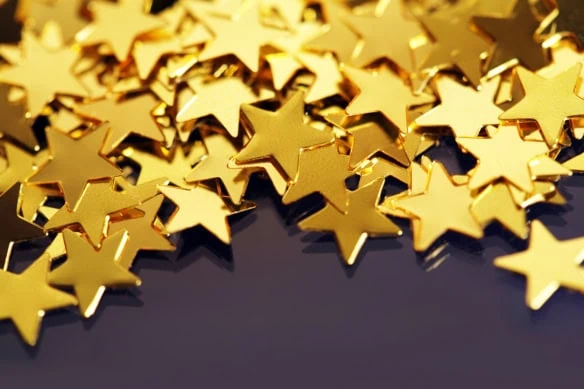 a pile of gold star glitter.