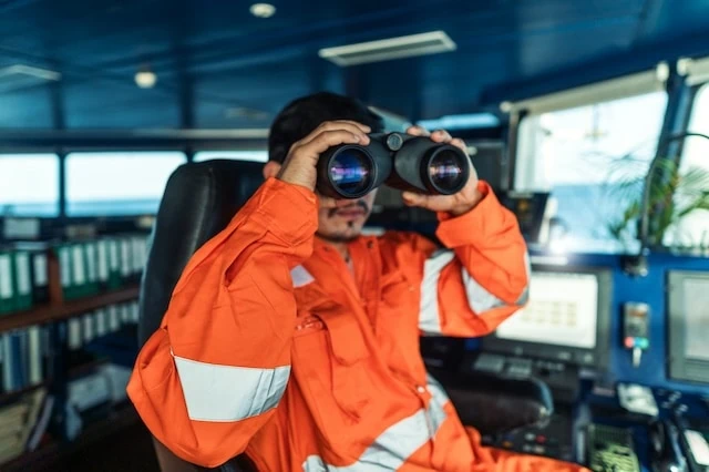 blue collar water transportation deck officer binoculars