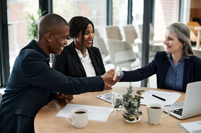 business meeting agreement handshake deal