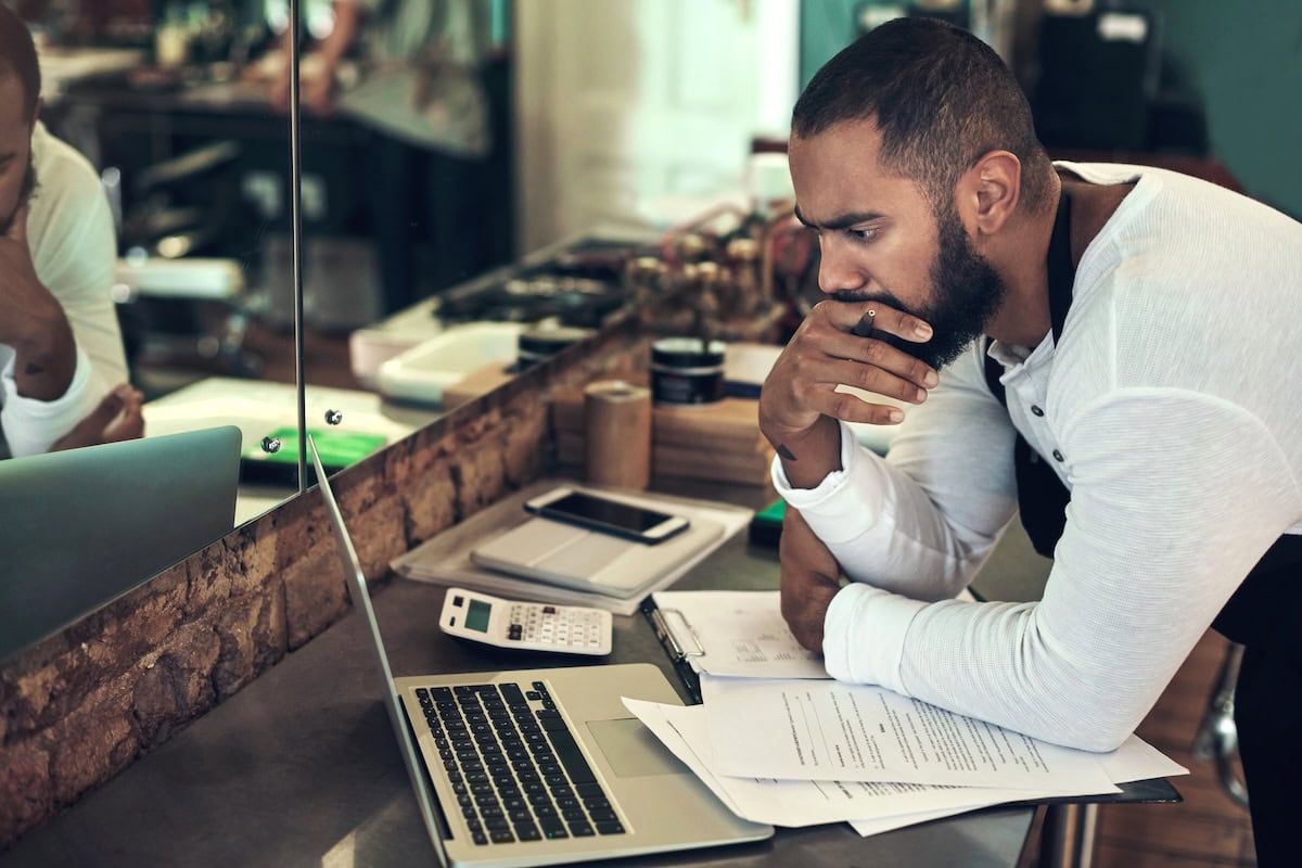 business owner taxes laptop forms calculator 1200