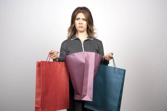 buying shopping bags regret mistake remorse disappoint 1200