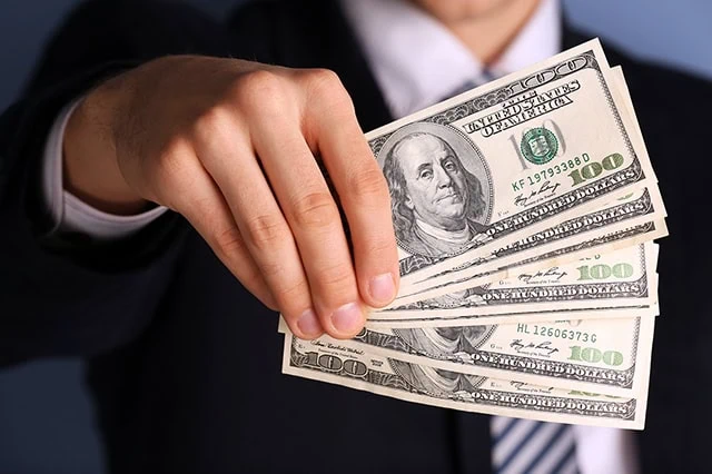 cash dividends businessman fan 640