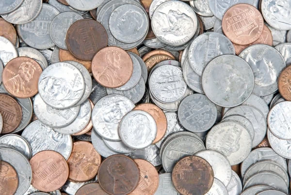a pile of pennies nickels and dimes.