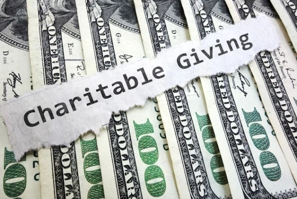 charity charitable giving dollar bills donation