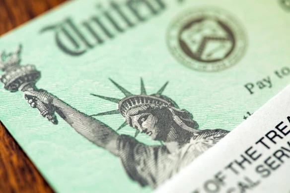 2026 Social Security COLA: Here's how much your benefits will rise 1 a united states treasury check.