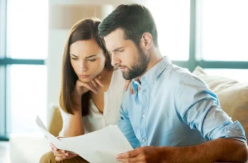 couple worried bills finances 1200