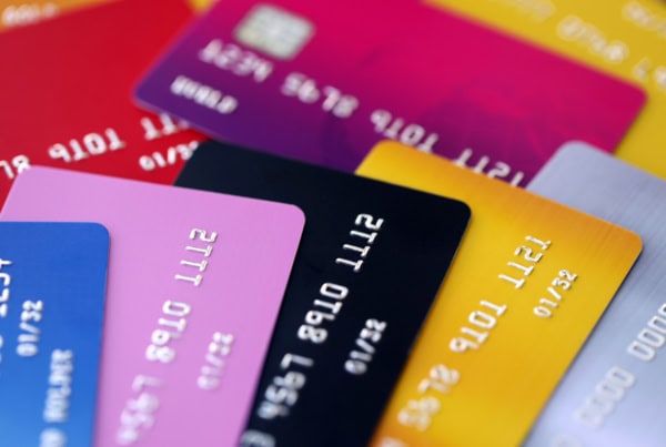 several credit cards of different colors.
