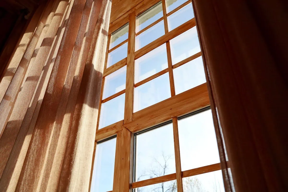 High Temperatures Don't Have to Mean Sky-High Energy Bills: 8 Tips to Keep Costs Down 3 cut energy costs window curtain shade
