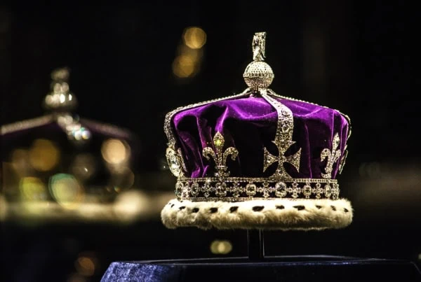 a purple crown on a stand.