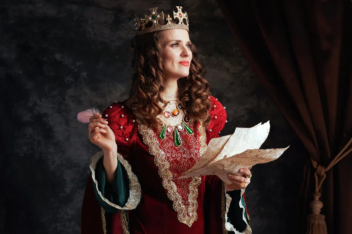 Blue-Chip Dividend Kings Add a New Member (Here's All 33) 3 A queen thinks while preparing to write something on parchment.