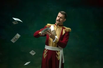 a man dressed up as a king making it rain with dollar bills.