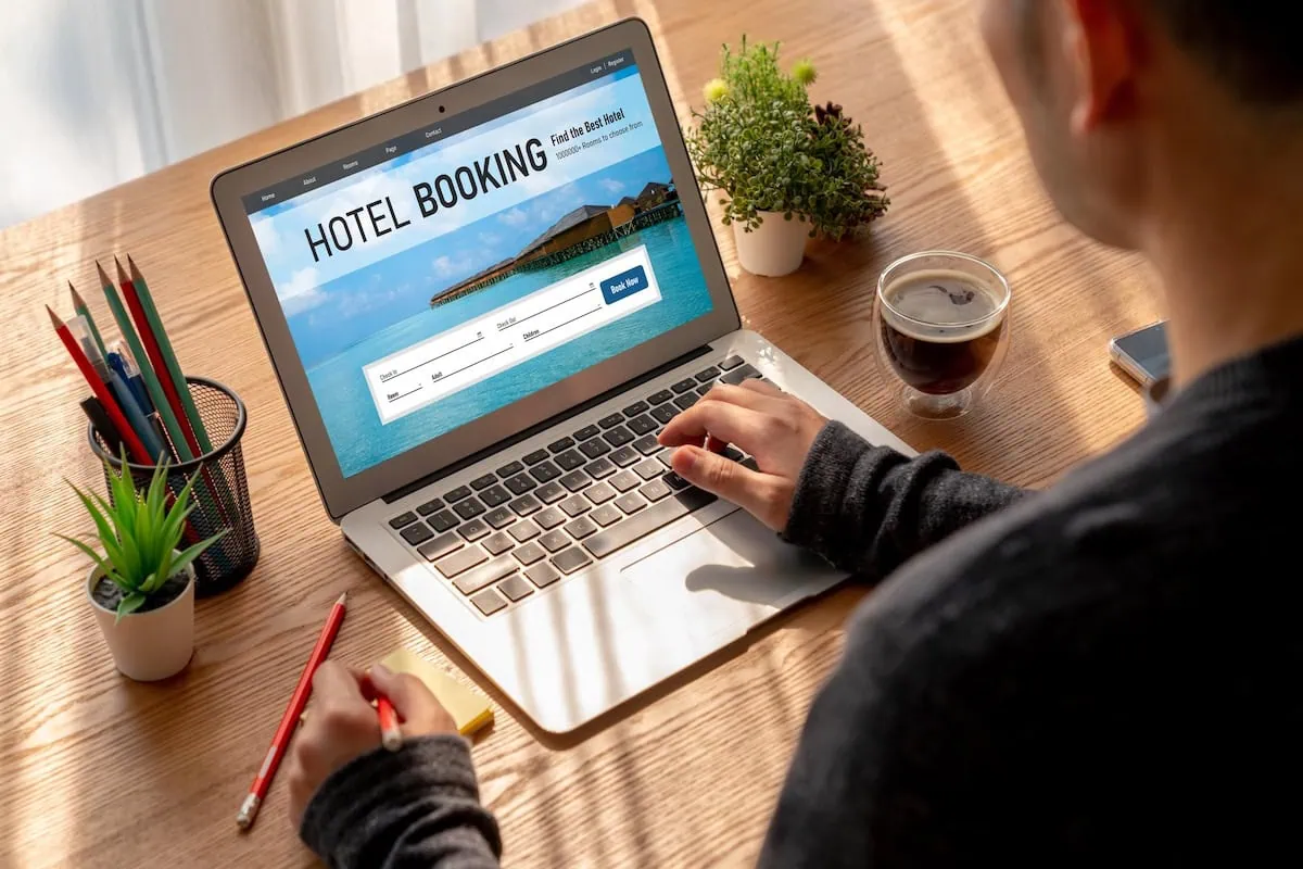 Slash Your Travel Budget: 10 Hotel Chains With Secret Senior Rates 2 dynamic pricing hotel booking laptop