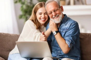 Happy father and daughter celebrating victory