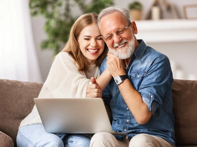 Happy father and daughter celebrating victory