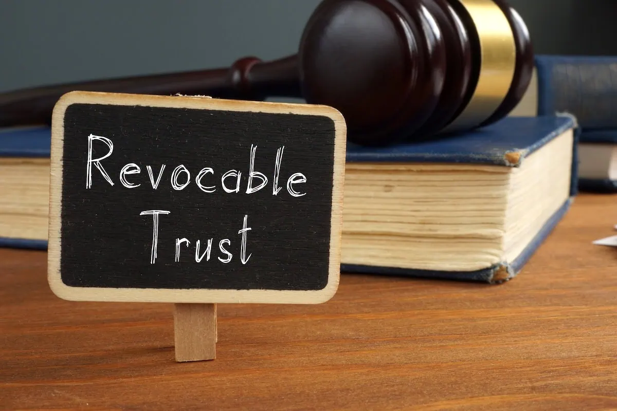 The Estate Planning Fork in the Road: Should You Create a Revocable or Irrevocable Trust? 3 estate planning revocable trust gavel books