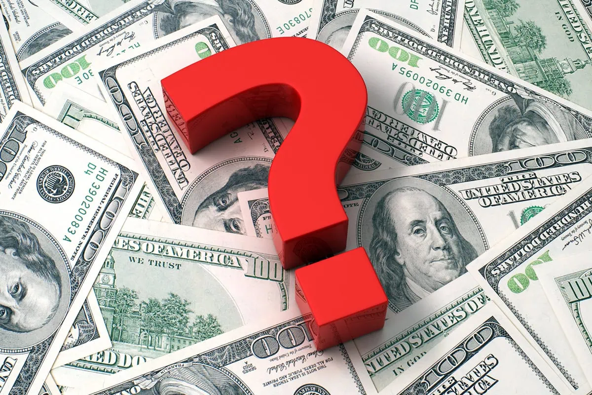 Our Favorite Dividend ETFs: 10 Funds, 10 Income Strategies 2 A question mark over hundred-dollar bills.