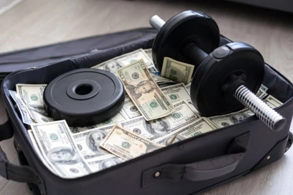 financial health suitcase cash dumbbell 1200