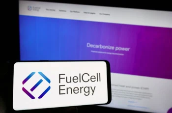 the fuelcell energy logo on a smartphone and a laptop.