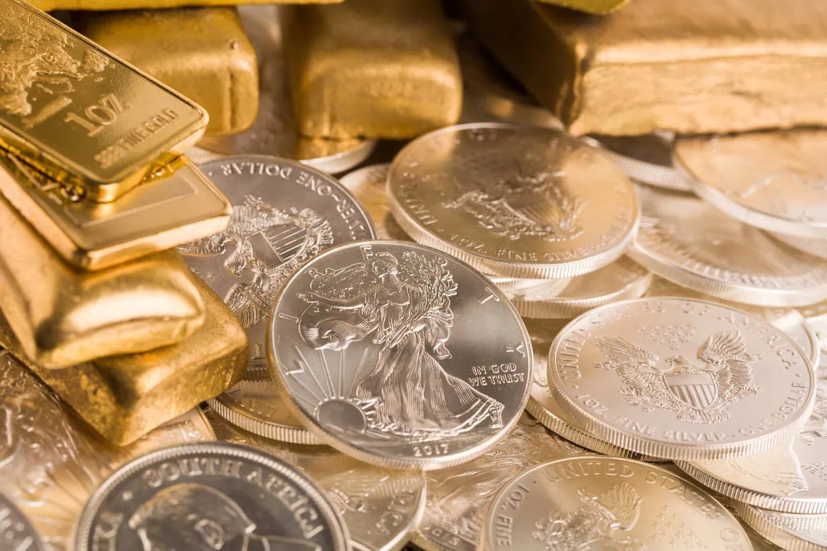 Want to Invest in Gold? These 7 ETFs Make It Easy. 6 gold bars vs silver coins etf