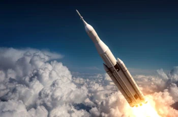 a rocket surges above the clouds and into space.