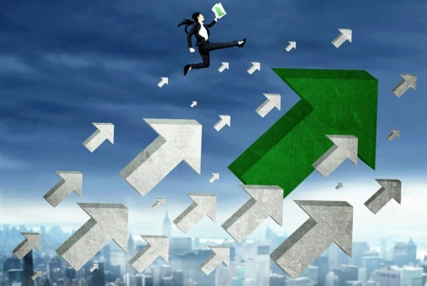 concept art of a business person jumping higher amid upward facing arrows flying through the sky.
