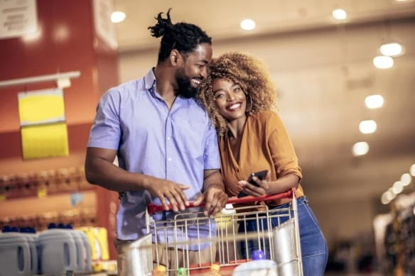 happy couple grocery shopping 1200