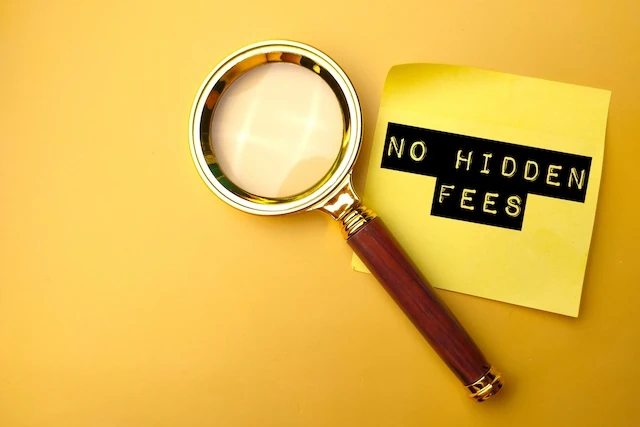 ๐ณ Cashless Kids: 7 Free Debit Cards That Teach Kids + Teens Money Management 37 Magnifying glass and sticky note with the word NO HIDDEN FEES