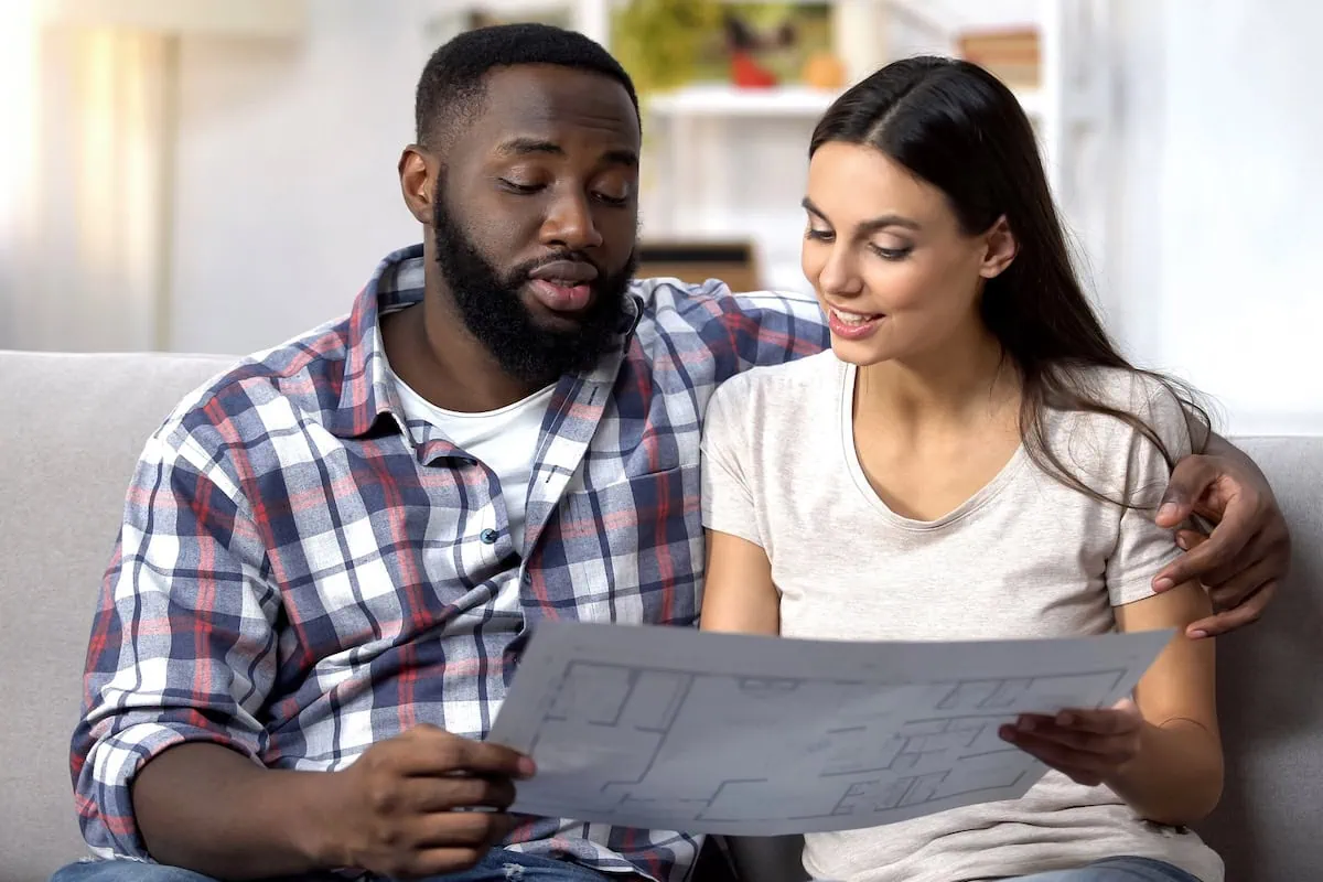 Skip These 10 Home Renovations Before You Sell Your House 3 home improvement renovation plan couple 1200