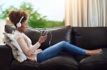 house sitting couch hustle headphones teen 1200