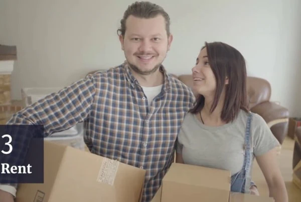 couple happy to unpack boxes for a new house