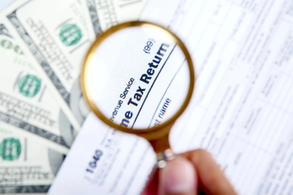income tax return from retirement magnifier 1200