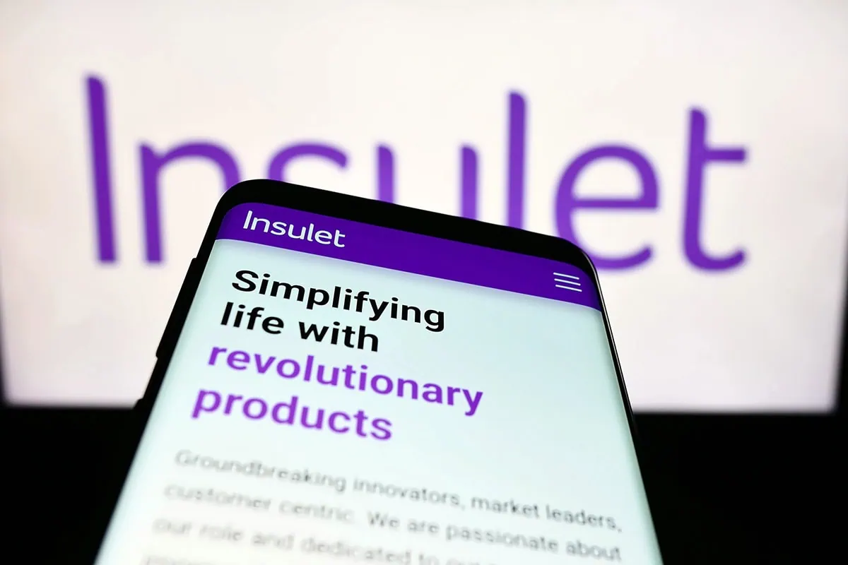 Looking for explosive growth? Check out these 7 top-rated stocks. 4 a smartphone with the insulet homepage showing.