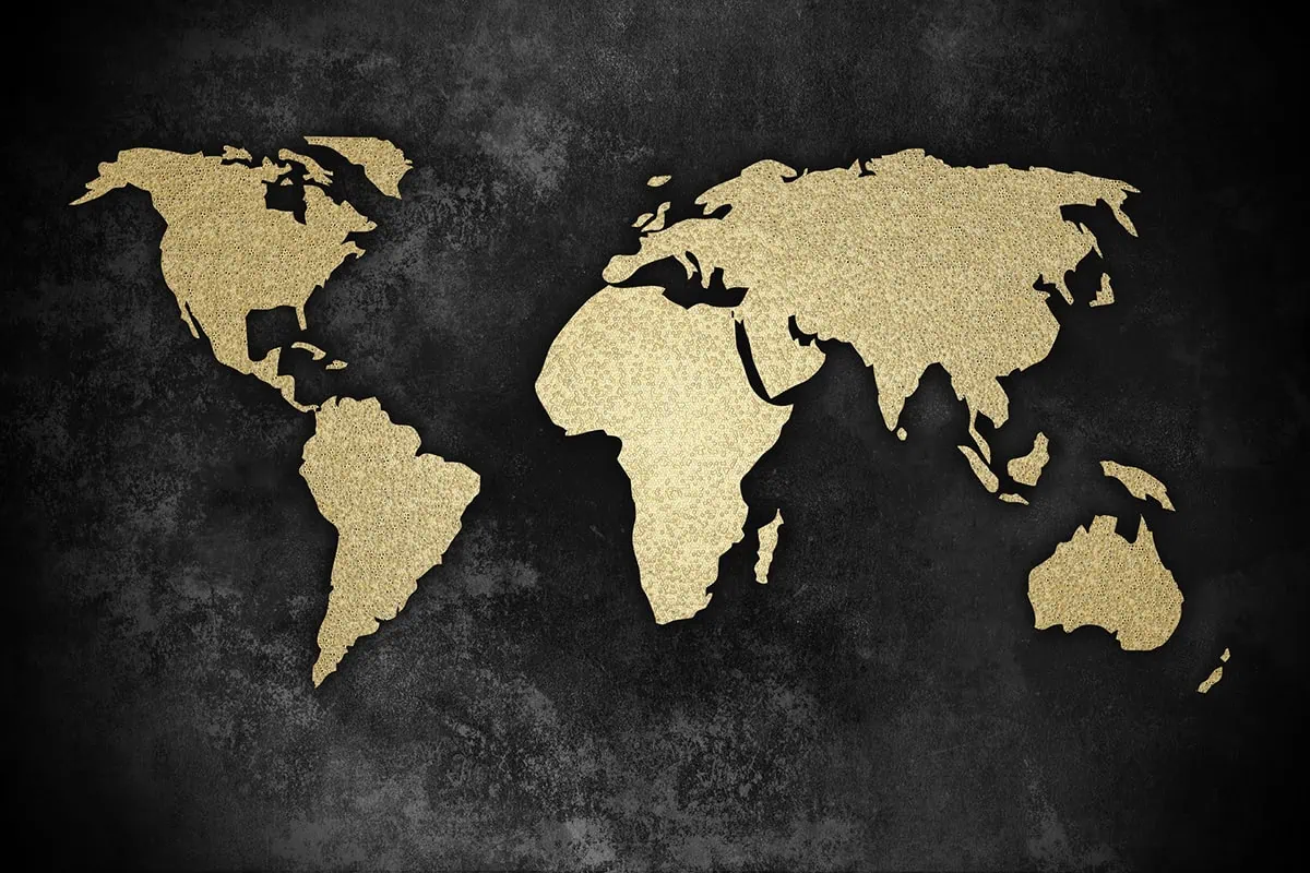 a map of the world in black and gold.