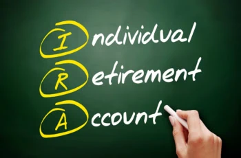 individual retirement account is written on a chalkboard.