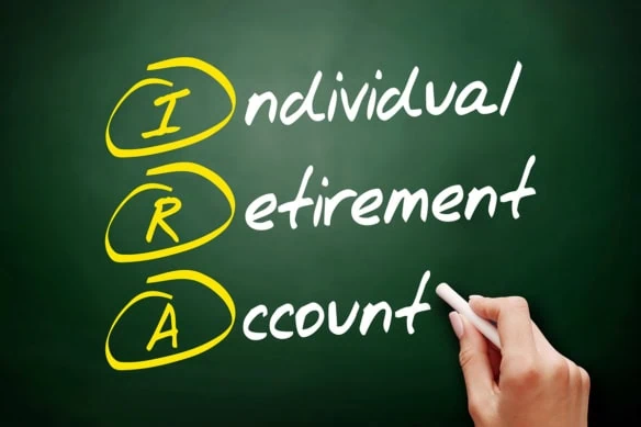 individual retirement account is written on a chalkboard.