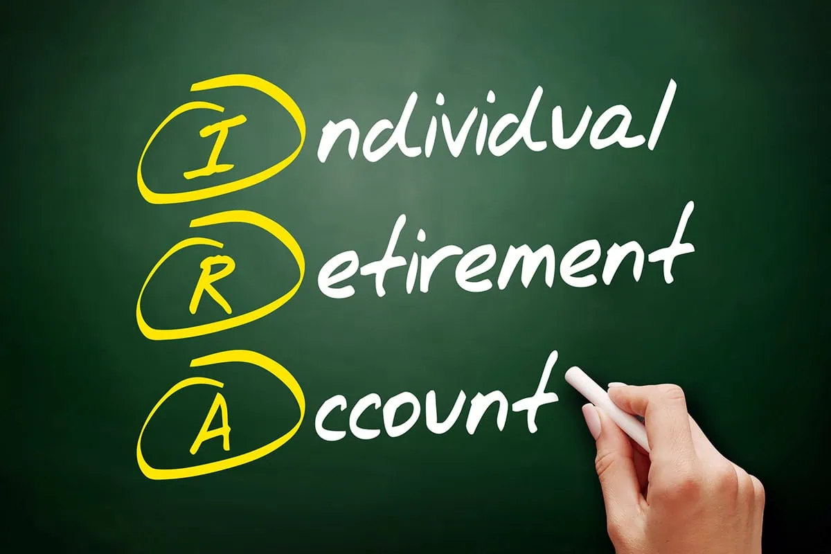 individual retirement account is written on a chalkboard.